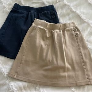 Two Uniform Skirts